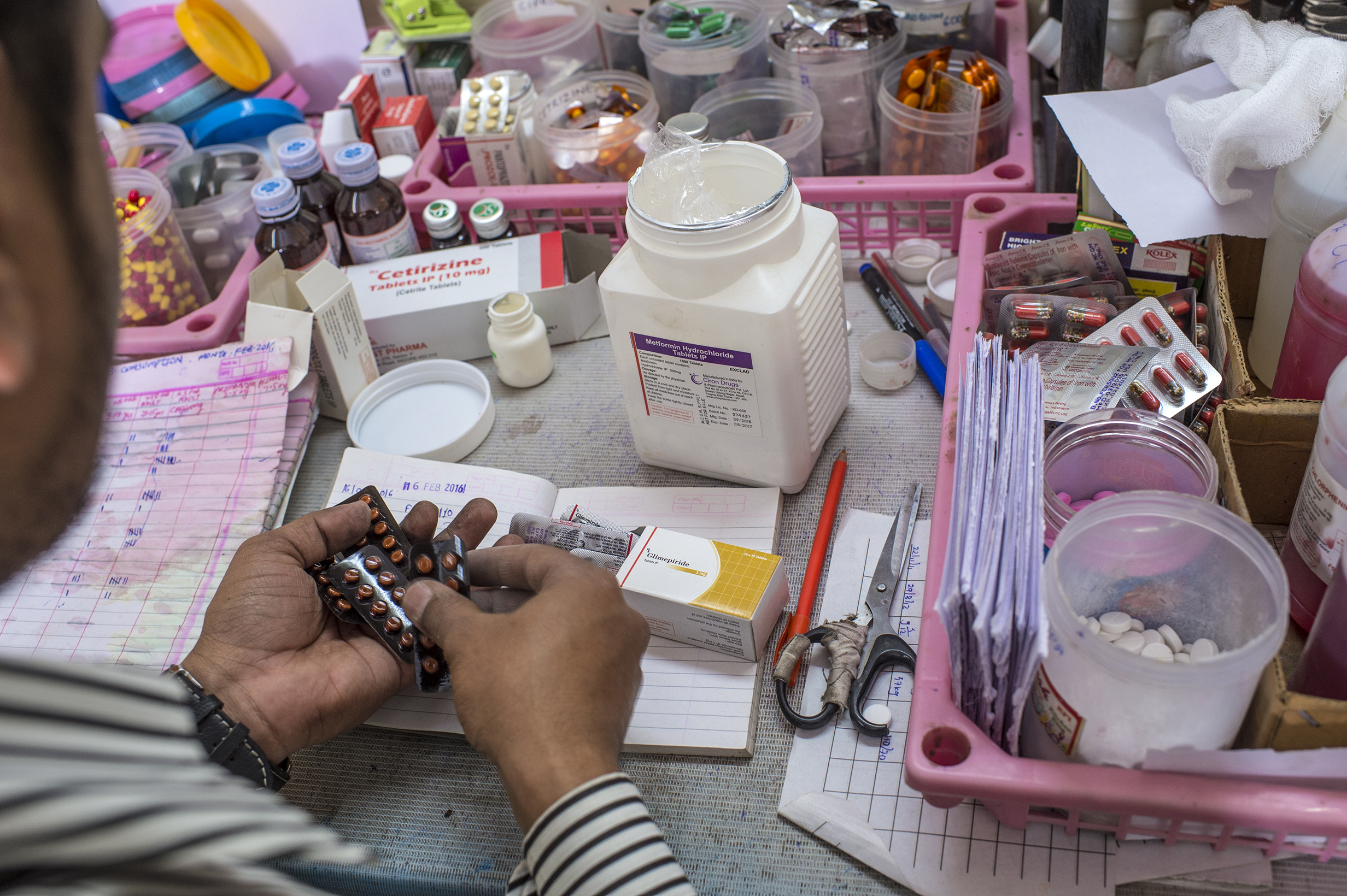 diabetes_medicines_india man manipulating medicines