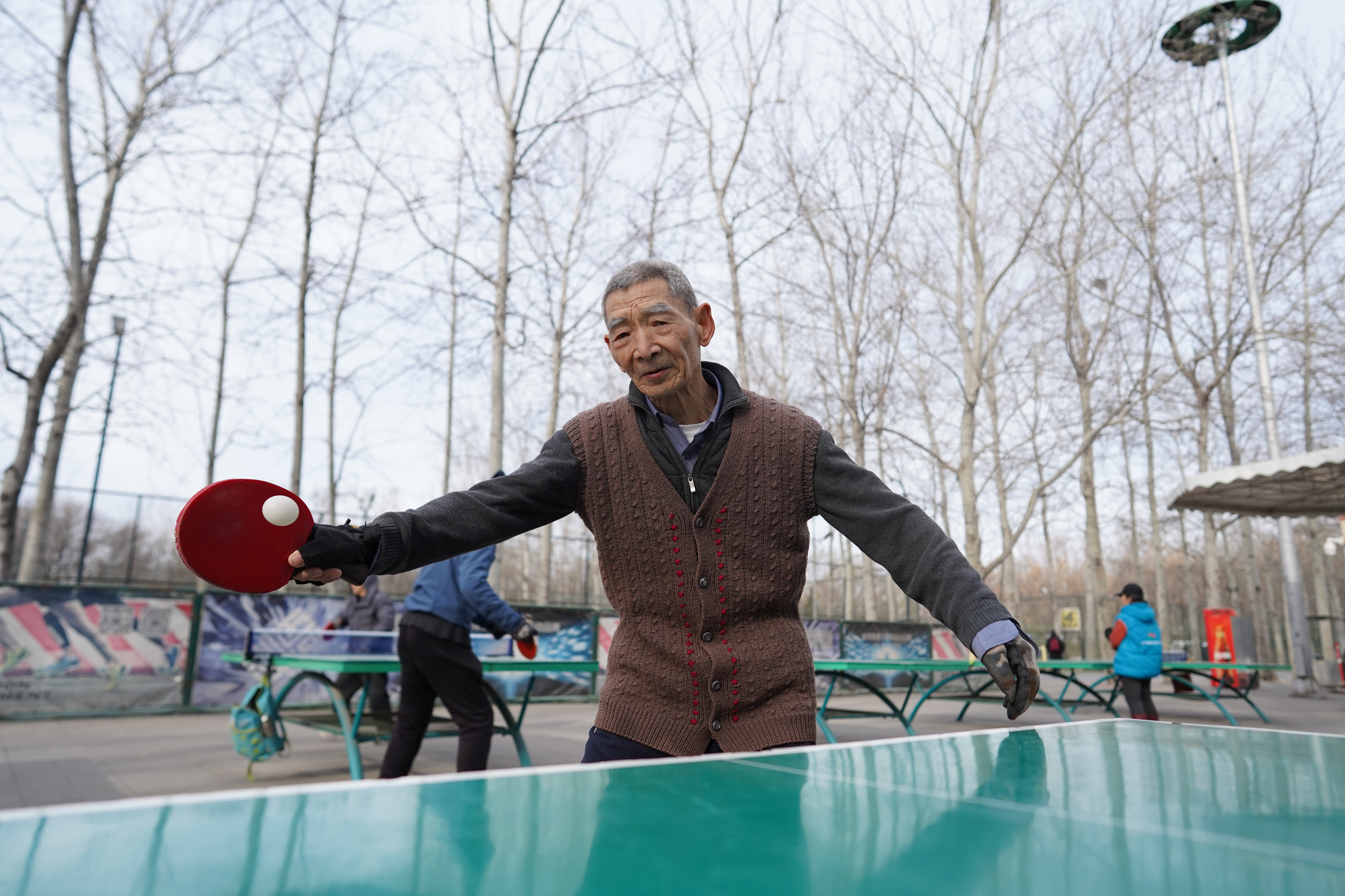 man playing table tennis man playing table tennis