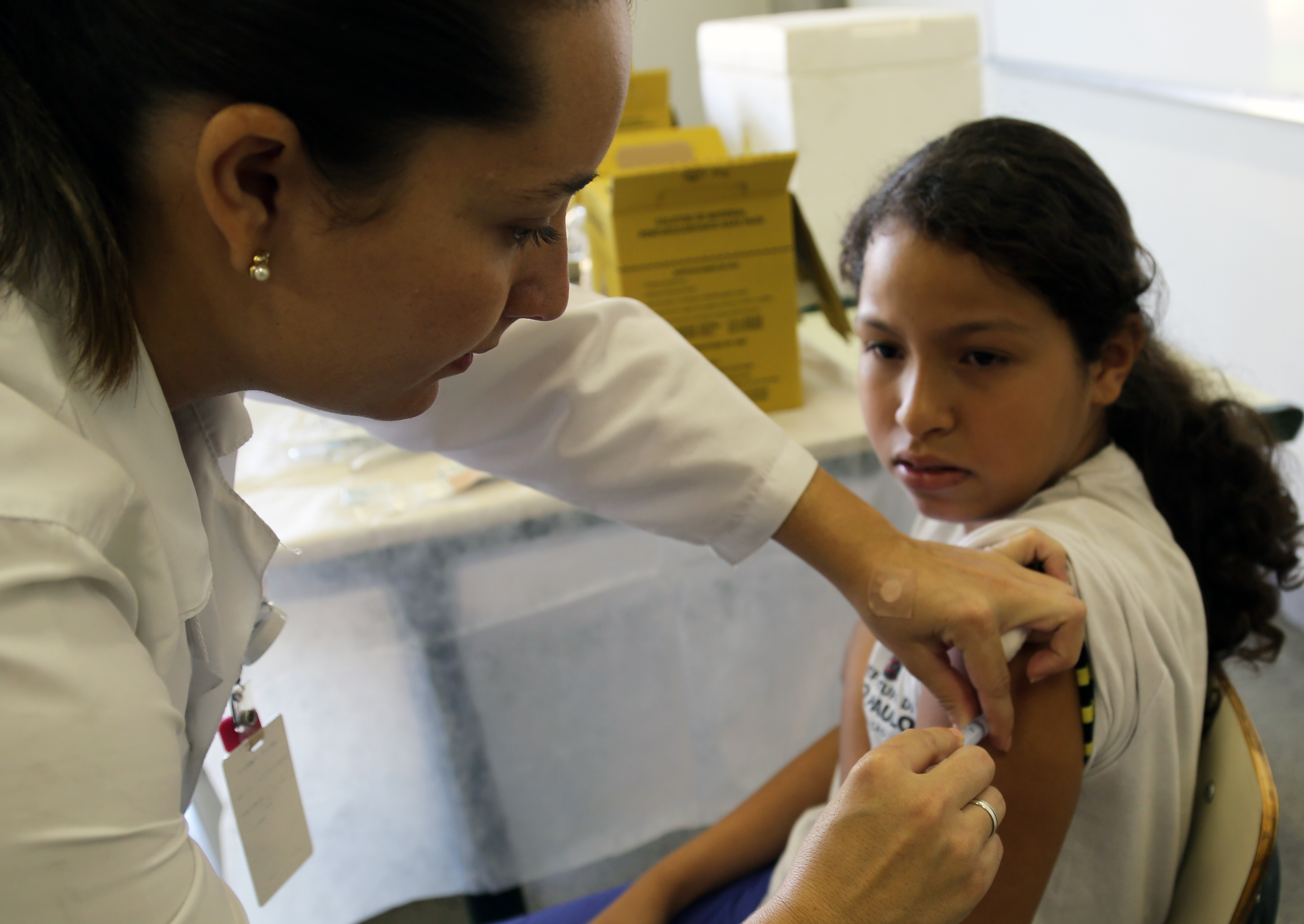 Young-girl-getting-HPV-vaccination Young girls getting Human papillomavirus (HPV) vaccination in their school, in São Paulo.