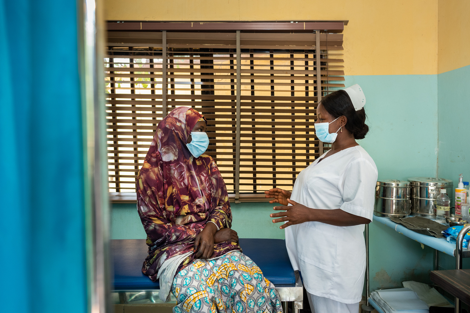 Nurse counsels a patient