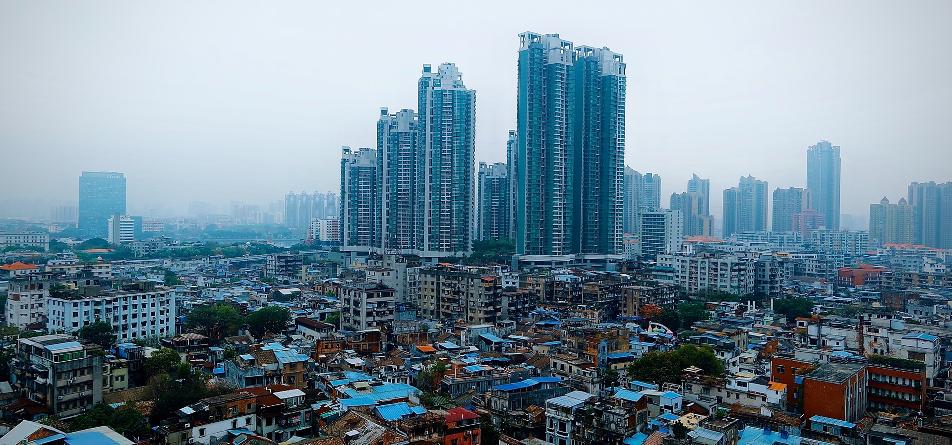 Health equity-city view photo of a city with high rise buildings