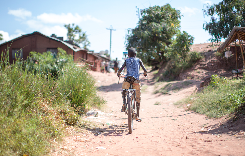Boy on bicycle in the Democratic Republic of the Congo