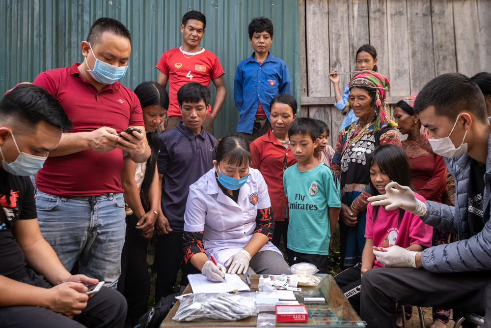 Health staff collect data into a malaria surveillance system