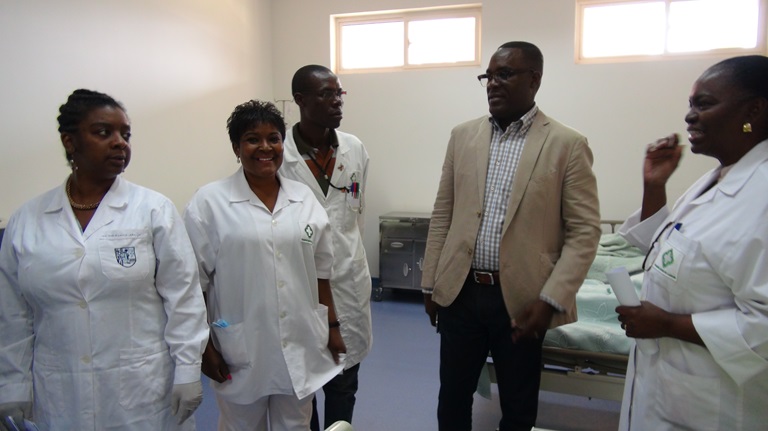 Health care workers discuss information and training materials at the Hospital Geral de Luanda, one of the three reference centres for yellow fever patients in Luanda province, Angola.