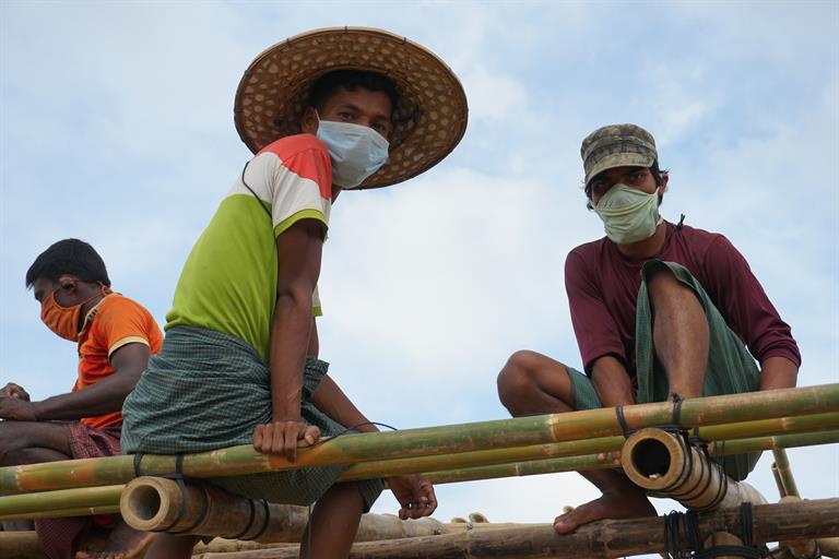 Rohingya refugees helping build IOM SARI ITC in Ukhiya with bamboo, the same material of their shelters. WHO Bangladesh
