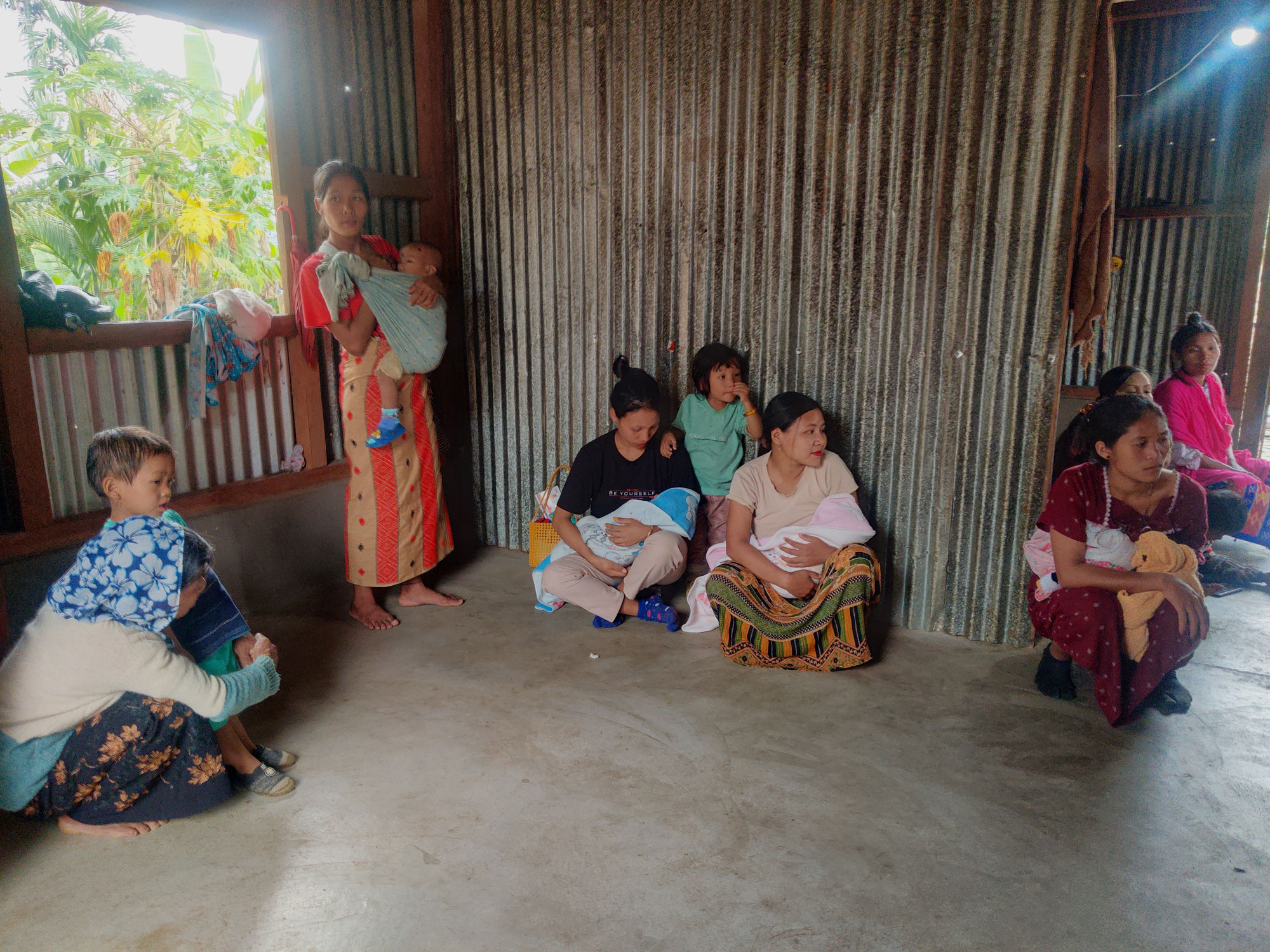 Mothers waiting to get their children immunized at the Chopnu Community Centre