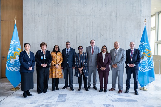 Group photo with incoming, outgoing and current WHO Regional Directors during the 154EB